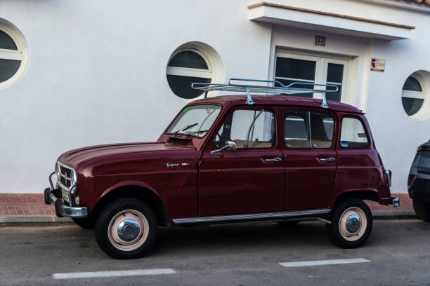 Ajaccio, France - July 6, 2015: Light blue Renault 4CV old-timer economy car stands parked on a roadside in French town
