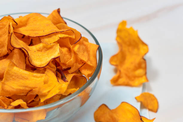 istock Sweet Potato Chips on an elegant marble table 1371133220