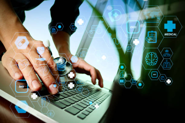 istock Doctor working at workspace with laptop computer in medical workspace office 1371136266