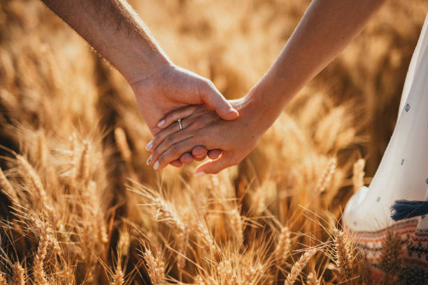 Romantic copule Romantic couple walking and holding hands. falling in love stock pictures, royalty-free photos & images