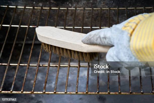 Wooden Wire Brush Cleans Dirty Barbecue Grill Rust Leather Protection Gloves Stock Photo - Download Image Now