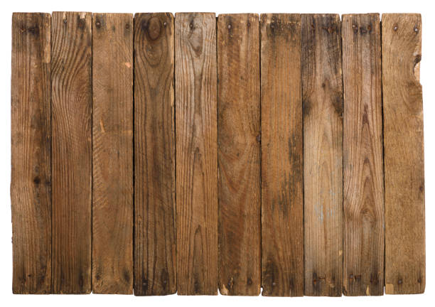 istock Wooden background from planks with rusty nails isolated on white. 1371137868