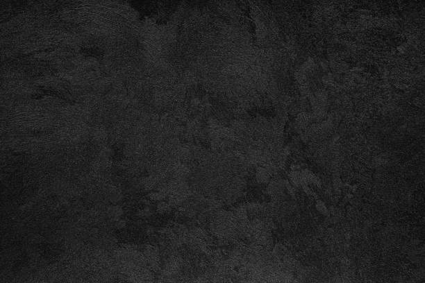 istock Texture of black decorative plaster or concrete. 1371140052