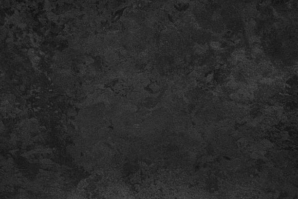 istock Texture of black decorative plaster or concrete. 1371140078