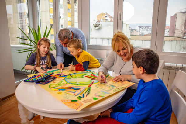 istock Happy children with parents making art about sustainability 1371145395