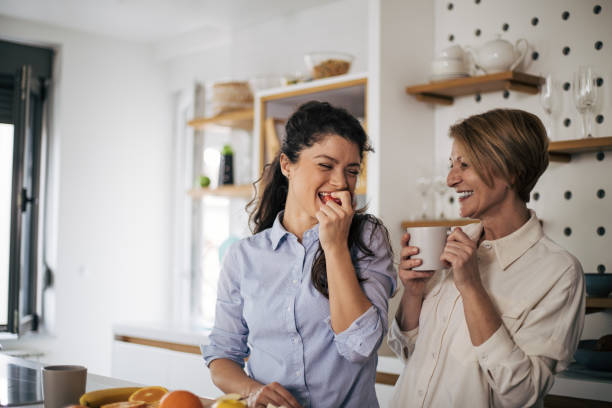 istock Mother with daughter at home 1371145433