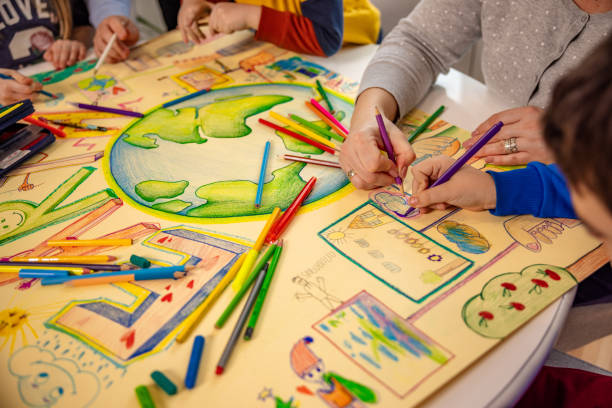 istock Unrecognizable mother, using art to teach her children about sustainability 1371145868
