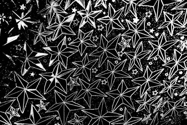 Real star background taken in winter looking up at the Northern sky. This area of sky is above the constellation of Orion looking along the Galactic Plane directly away from the Galactic centre.