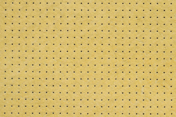 istock Yellow perforated fabric. Closeup of car cloth texture as background 1371147430