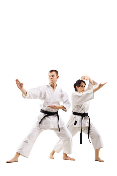 istock karate girl and boy fighting 1371148202