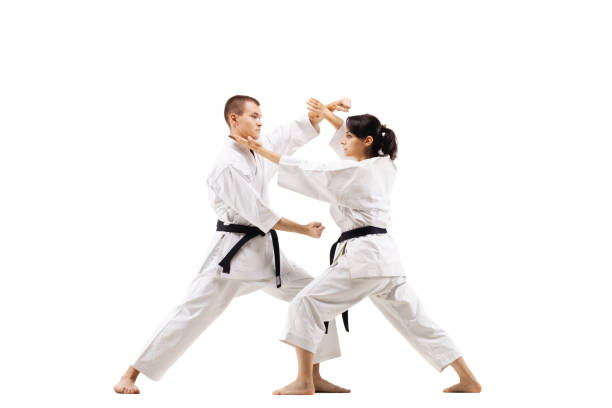 istock karate girl and boy fighting 1371148205