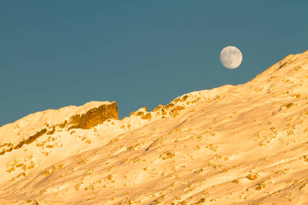 istock moon over col d'arrius in winter 1371148395