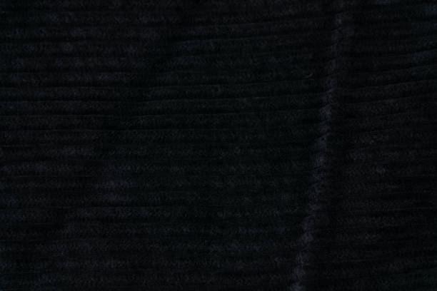 istock Black velvet fabric texture close up 1371148706