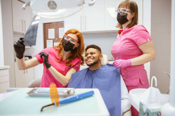 istock A young African-American paying a visit to a dentist 1371149711