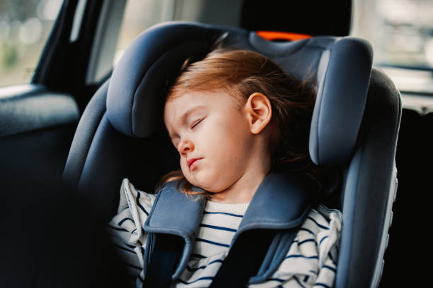 istock Little Girl Napping While Traveling by Car 1371149921