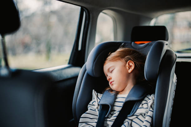 istock Little Girl Napping While Traveling by Car 1371149926