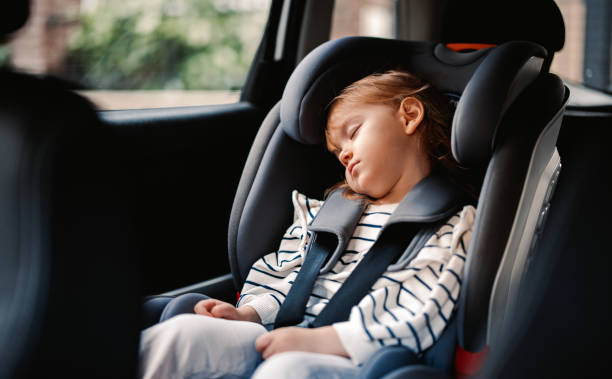 istock Little Girl Napping While Traveling by Car 1371149938