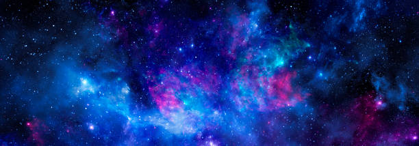 istock Cosmic background with bright nebula and shining stars 1371150555