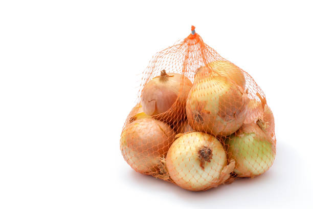 istock Bag Of Onions On White 1371151964