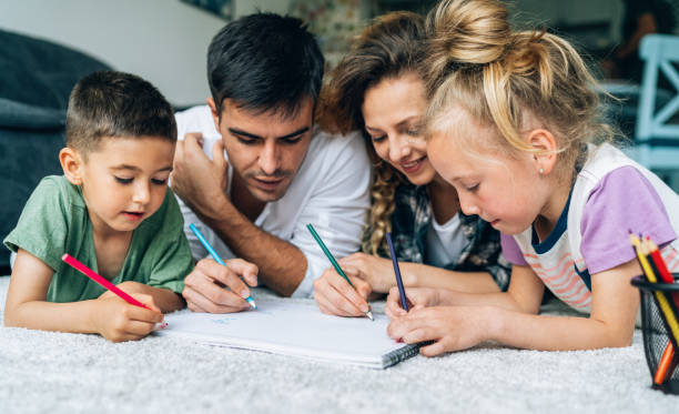 istock Family drawing on floor at home 1371152080