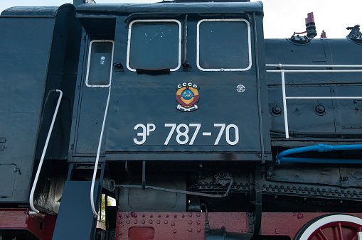 Bryansk / Russia - May 09, 2014.\n\nMonument-steam locomotive Er 787-20 at Bryansk-Orlovskiy station of Moscow Railway.\n\nThis project based on the project P-28 of Kolomzavod (Kolomna, Moscow region) and was built in Hungary, Romania, Czechoslovakia, Poland in 1946-1957.