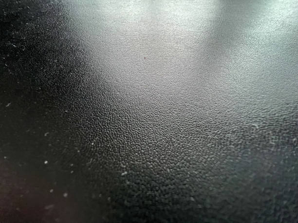 istock Very fine black leather as texture or background. 1371155959