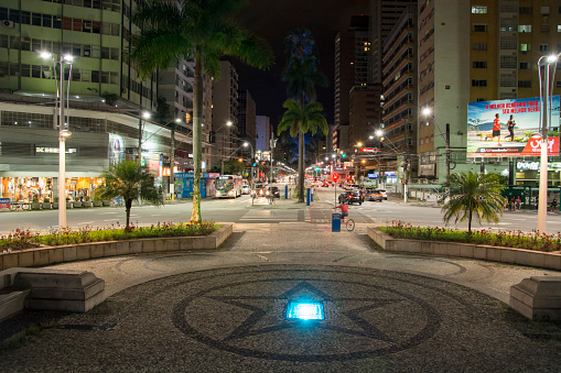 Santos, São Paulo - Brazil - November 9, 2014: Night view of the Gonzaga neighborhood and Dona Ana Costa avenue from Independência square in the city of Santos.