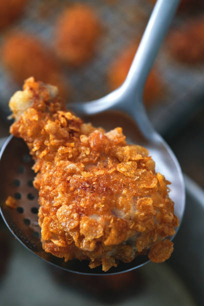 istock Crispy Fried Chicken Drumsticks with French Fries 1371157854