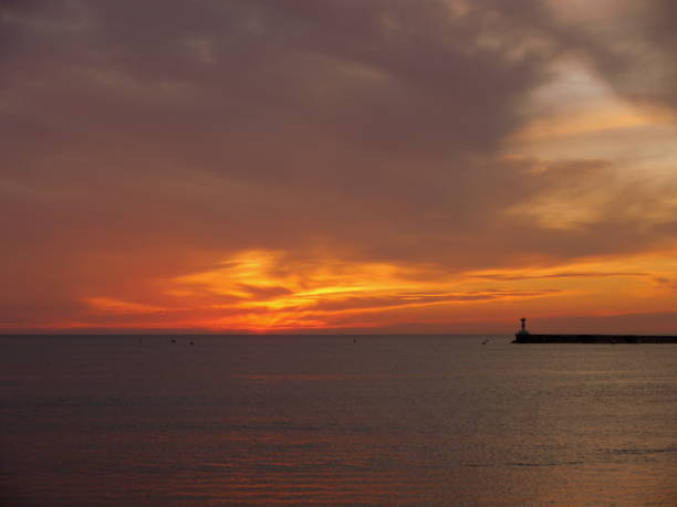 istock Orange sunset on the sea 1371159284