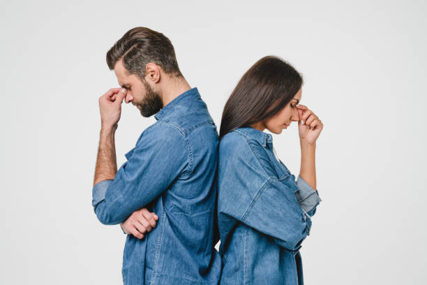 istock Misunderstanding between partners in relationship. Breakup, abuse between spouses. Girlfriend and boyfriend arguing, having marriage divorce, scandal, cheating isolated in white background 1371161400