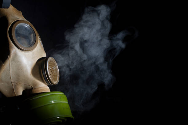 Gas mask Russian Gas mask with smoke on black background biological warfare stock pictures, royalty-free photos & images