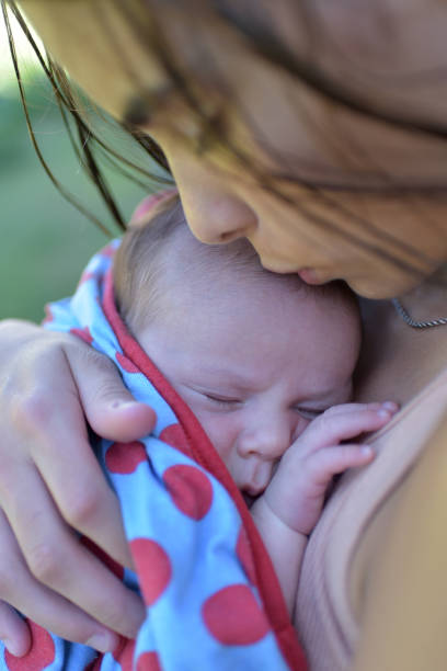 istock newborn baby in arms 1371164069