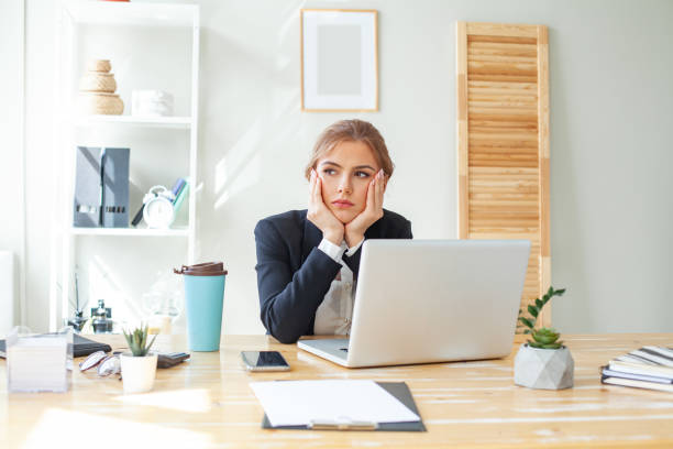 istock Thinking businesswoman in office 1371164878
