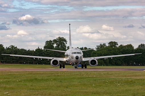 Gloucestershire, UK - July 14, 2014: United States Navy (USN) Boeing P-8A Poseidon Maritime patrol and Anti-Submarine warfare aircraft taxiing at Fairford.