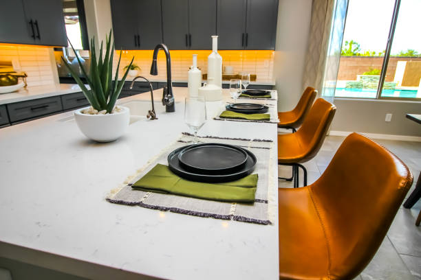 istock Kitchen Island Counter Top With Place Settings 1371168206
