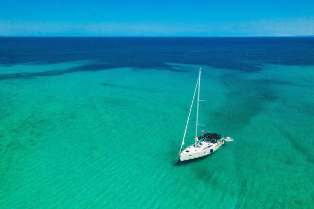 istock Anchored sailboat, view from drone 1371168516