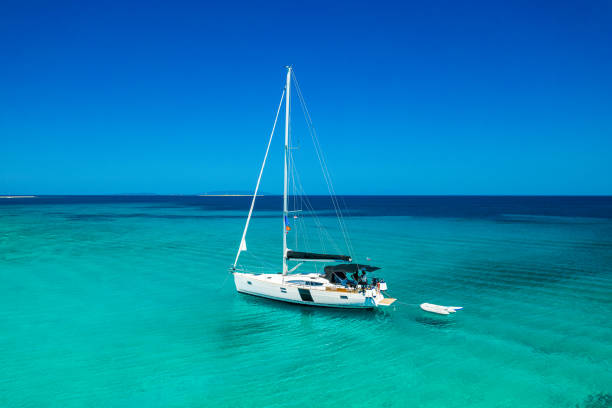 istock Anchored sailboat, view from drone 1371168763