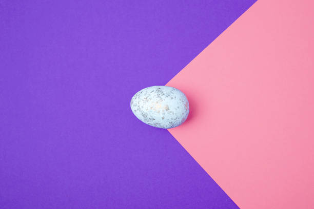 istock Easter eggs on a colored background. Festive banner with copy space. 1371169813