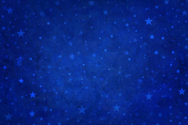 Stars on blue background, 4th of July design, veterans day or memorial day backdrop, starry night stock photo