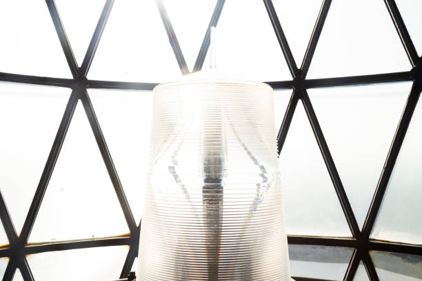 istock Lighthouse Bulb / Beacon lamp in the lighthouse against Panoramic View Cape Florida Lighthouse and Lantern in Bill Baggs State Park in Miami, Florida, USA 1371173149