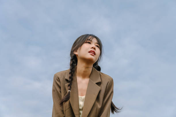 istock A young girl playing on the grass 1371174549