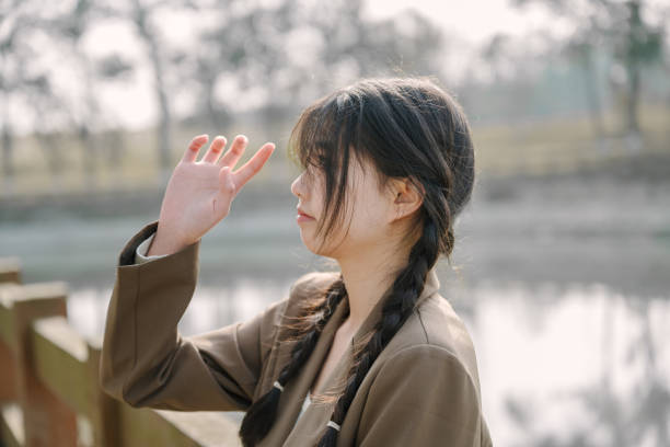 istock A young girl playing happily by the bridge 1371174553