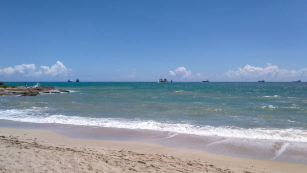 istock View of cargo ships from the beach 1371175440