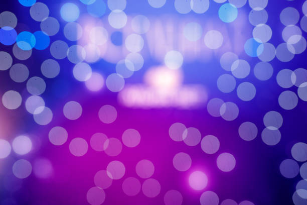 Abstract purple background. Lights in bokeh