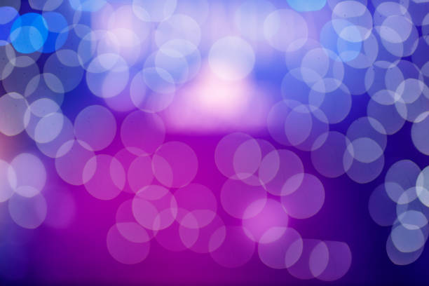 istock Abstract purple background. Lights in bokeh. 1371175624