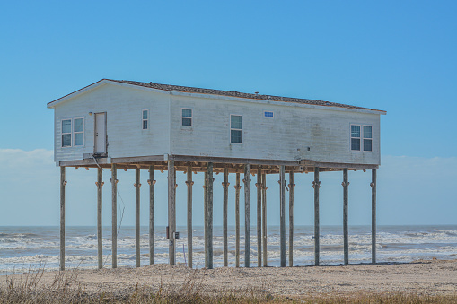 Hurricane Ike eroded beach sand from this abandoned home on the Gulf of Mexico, Bolivar Peninsula, Texas