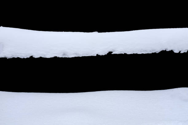 istock snow isolated on a black background. winter design element 1371181469