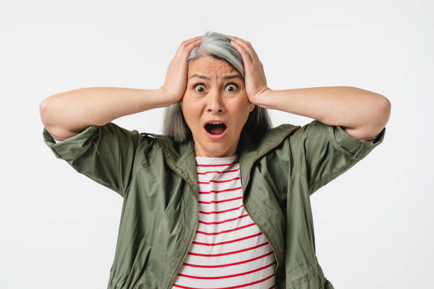 Shocked impressed crying mature middle-aged caucasian woman shouting, feeling scared terrible horrible, fear isolated in white background. Sale discount offer concept Shocked impressed crying mature middle-aged caucasian woman shouting, feeling scared terrible horrible, fear isolated in white background. Sale discount offer concept women screaming surprise fear stock pictures, royalty-free photos & images