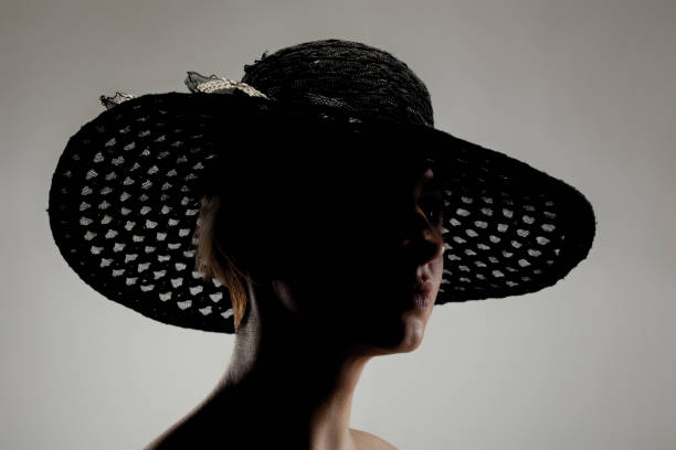 istock silhouette girl portrait with a hat 1371182533