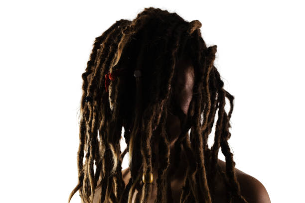istock girl with dreadlocks in front of her face 1371184512